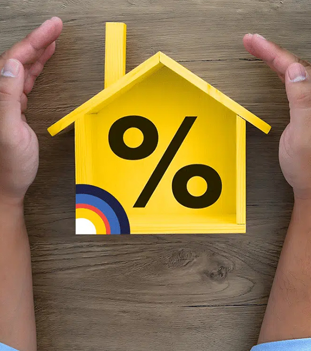 Young couple discussing interest-only mortgage payment schedule with mortgage specialist