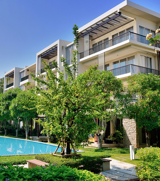 Buyer meeting with mortgage broker to review condo loan qualification requirements